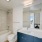 Bathrooms with tiled showers and quartz countertops. All homes come with in-unit laundry