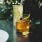 a glass with a drink in it