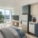 a kitchen with a couch and a table